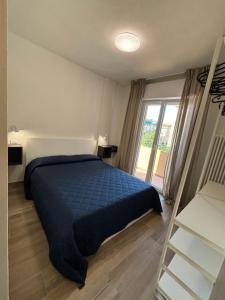 Postel nebo postele na pokoji v ubytování Lugano 41 by ALEhotels