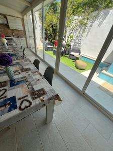 Πισίνα στο ή κοντά στο Holiday In Porto Cesareo