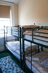 Двуетажно легло или двуетажни легла в стая в Botanic Avenue Hostel less than a mile from the City Centre