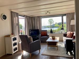 Posezení v ubytování Haus Gaby direkt am Lauwersmeer