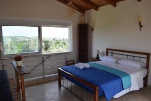 Posteľ alebo postele v izbe v ubytovaní ILIAS VILLA IN CHANIA