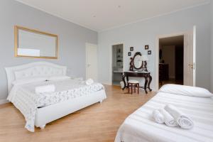 Postel nebo postele na pokoji v ubytování B&B Villa Etelka