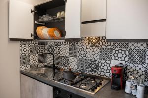 Kuchyň nebo kuchyňský kout v ubytování Vilè Home - Intera Villa