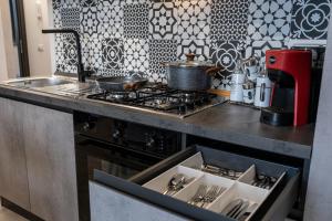 Kuchyň nebo kuchyňský kout v ubytování Vilè Home - Intera Villa