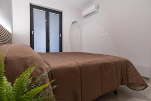Postel nebo postele na pokoji v ubytování Vilè Home - Intera Villa