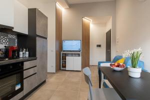 Kuchyň nebo kuchyňský kout v ubytování Vilè Home - Intera Villa