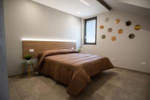 Postel nebo postele na pokoji v ubytování Vilè Home - Intera Villa