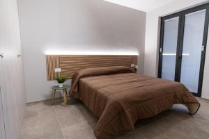 Postel nebo postele na pokoji v ubytování Vilè Home - Intera Villa