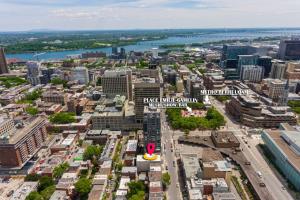 an aerial view of a city with a large city at Central King Studio in Montreal +5 photos