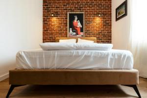 Postel nebo postele na pokoji v ubytování Gramofon INN