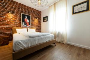 Postel nebo postele na pokoji v ubytování Gramofon INN