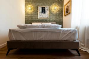 Postel nebo postele na pokoji v ubytování Gramofon INN