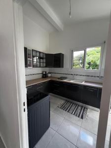 Kuchyň nebo kuchyňský kout v ubytování Appartement Jayden