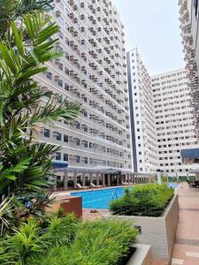 Bazén v ubytování 1014 - Cavite Minimalist Condo with Resort-like Amenities & Hi Speed Wifi nebo v jeho okolí + 8 fotografií