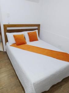 Postel nebo postele na pokoji v ubytování Hotel Campestre Maguey