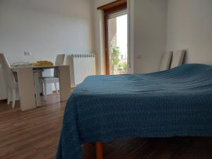 Un pat sau paturi într-o cameră la A Casa di Vale