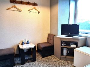 Μια τηλεόραση ή/και κέντρο ψυχαγωγίας στο Hotel Tetora Higashimuroran - Vacation STAY 75836v