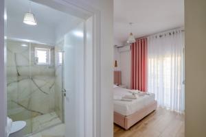 Koupelna v ubytování Eleni Guest House + 37 fotografií