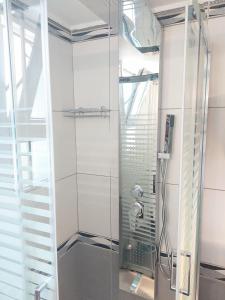 Kúpeľňa v ubytovaní Acropolis museum grand apartment