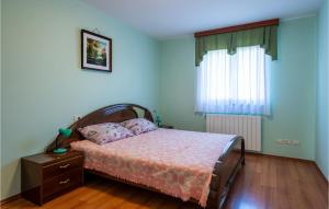 Postel nebo postele na pokoji v ubytování Holiday Home Grandici Iv