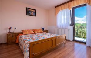 Postel nebo postele na pokoji v ubytování Holiday Home Grandici Iv