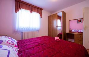 Postel nebo postele na pokoji v ubytování Holiday Home Grandici Iv