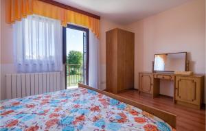 Postel nebo postele na pokoji v ubytování Holiday Home Grandici Iv