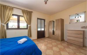 Postel nebo postele na pokoji v ubytování Holiday Home Grandici Iv