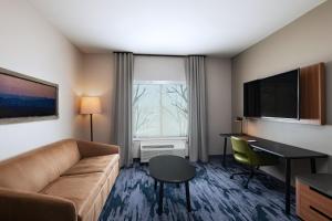 TV a/nebo společenská místnost v ubytování Fairfield by Marriott Inn & Suites Austin Georgetown