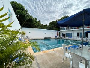 Πισίνα στο ή κοντά στο Tropical Resort Tocaima