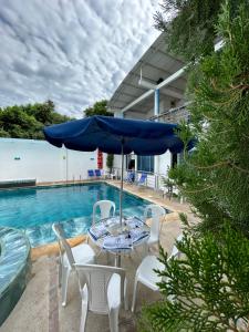 Πισίνα στο ή κοντά στο Tropical Resort Tocaima