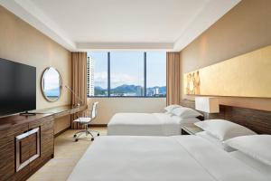Postel nebo postele na pokoji v ubytování Sheraton Nha Trang Hotel & Spa