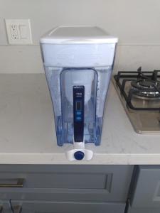 a blender sitting on a counter next to a stove at LA Love Home in Los Angeles