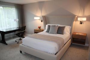 Un pat sau paturi într-o cameră la Erik's Retreat