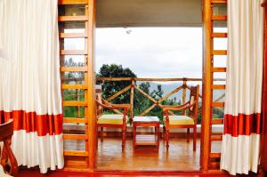 Balkón nebo terasa v ubytování Hanging Huts Resorts