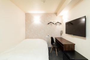 Televisyen dan/atau pusat hiburan di Toyama Town Hotel
