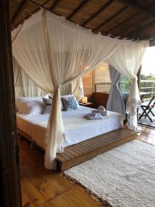 Postel nebo postele na pokoji v ubytování Casa Ocean Trancoso