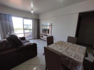 Ruang duduk di Apartamento com mobília nova 302