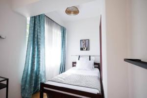 Postel nebo postele na pokoji v ubytování Botanist Split