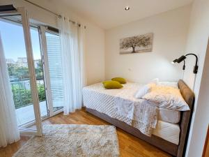Posteľ alebo postele v izbe v ubytovaní Studio Apartment Mandic