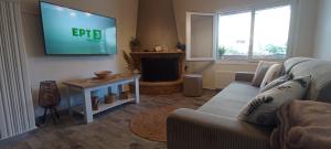 A television and/or entertainment centre at Sweet Maisonette in Corfu Town