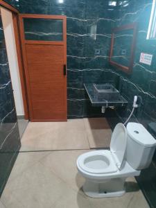 Ένα μπάνιο στο Mango Guesthouse