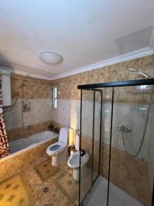 Koupelna v ubytování Garden Villa Guni