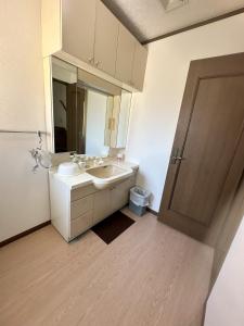Koupelna v ubytování Kei Chia Private Lodging