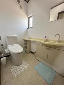 Koupelna v ubytování Kei Chia Private Lodging