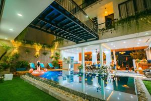 Bazén v ubytování Beach Palm Villa Hoi An nebo v jeho okolí