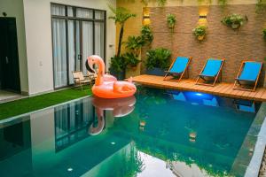 Bazén v ubytování Beach Palm Villa Hoi An nebo v jeho okolí