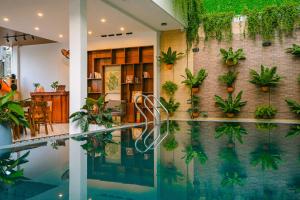 Bazén v ubytování Beach Palm Villa Hoi An nebo v jeho okolí