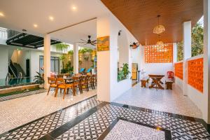 Posezení v ubytování Beach Palm Villa Hoi An