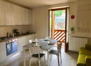 A kitchen or kitchenette at Casa Caterina - Riva di Solto - Iseo Lake